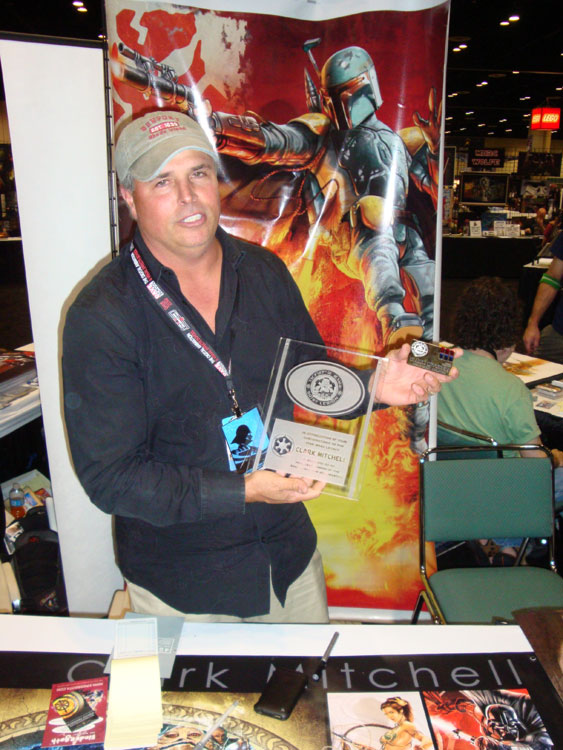 Clark Mitchell showing off his plaque